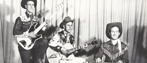 1950s musician entertainers dressed as cowboys