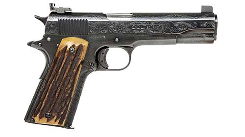Close-up of Al Capone's 'favorite' Colt pistol. It is black, and the grip has decorative carved wood added to either side.